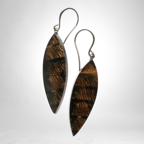 Style and Grace JUNO black earrings featuring elongated leaf-shaped beads with textured gold and black patterns