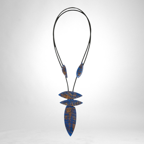 Style and Grace JUNO adjustable pendant necklace featuring five blue textured wooden beads on a black cord