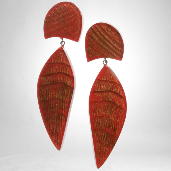 Style and Grace JUNO red earrings featuring two-bead resin drops with gold textured detailing on a pin backing.