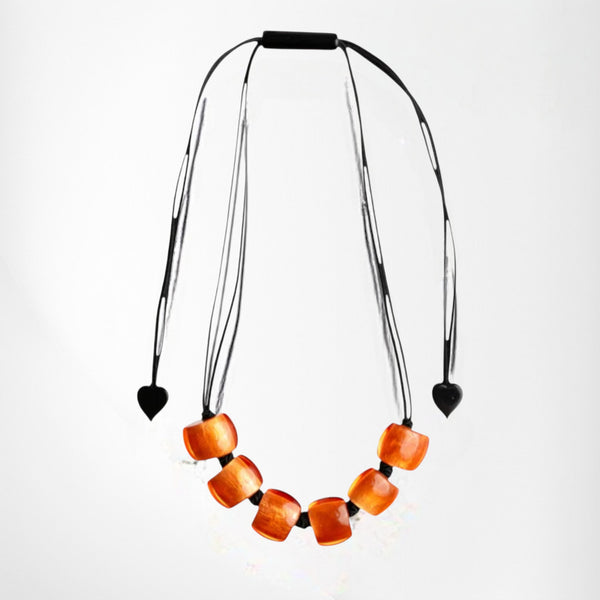 Style and Grace BELLISSIMA GRED adjustable necklace featuring orange square resin beads on a black cord